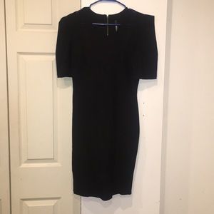 Simple black LBD w/exaggerated shoulders